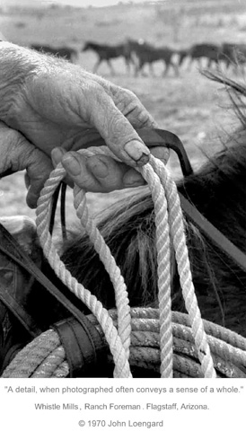 A ranch foreman's hand around rope while riding a horse at Whistle Mills in Flagstaff, Arizona.