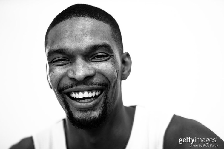 MIAMI, FL - SEPTEMBER 28: (EDITORS NOTE: Image has been converted to black and white.) Chris Bosh #1 of the Miami Heat poses for a portrait during media day at AmericanAirlines Arena on September 28, 2015 in Miami, Florida. (Photo by Rob Foldy/Getty Images) *** Local Caption *** Chris Bosh